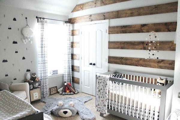 rustic nursery with shiplap accent wall