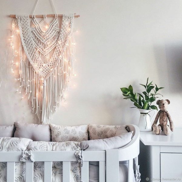 macrame and string lights wall decoration ideas for nursery room