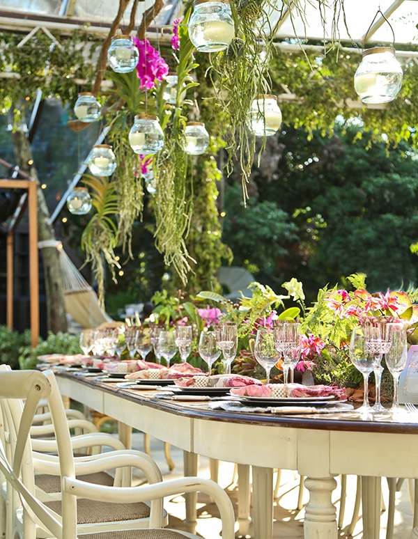 wedding table decoration floral centerpiece hanging candles in glass baubles