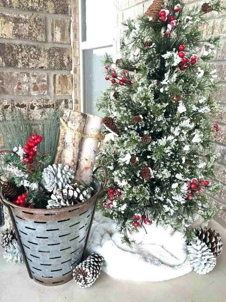 country outdoor decoration Christmas tree and bucket