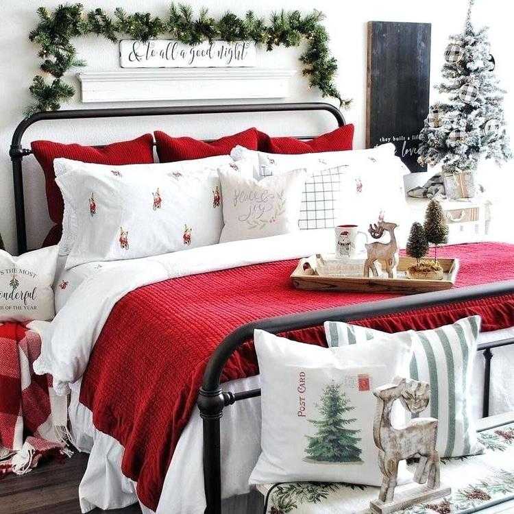 easy christmas bedroom decor garland above headboard bedding set
