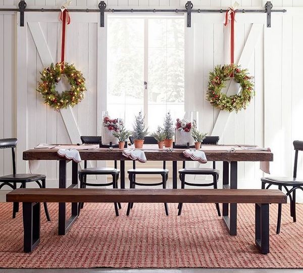 festive dining room decor Christmas wreaths and tabletop trees