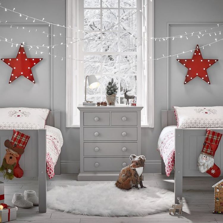 gray bedroom Christmas decor ideas string lights stars stockings