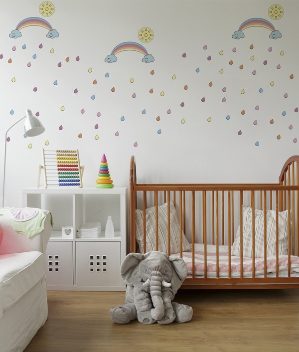 nursery room ideas white walls with rainbows and colorful toys