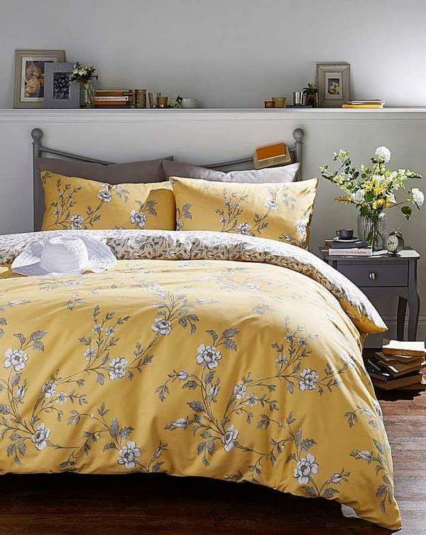 yellow and grey bedding set with floral print