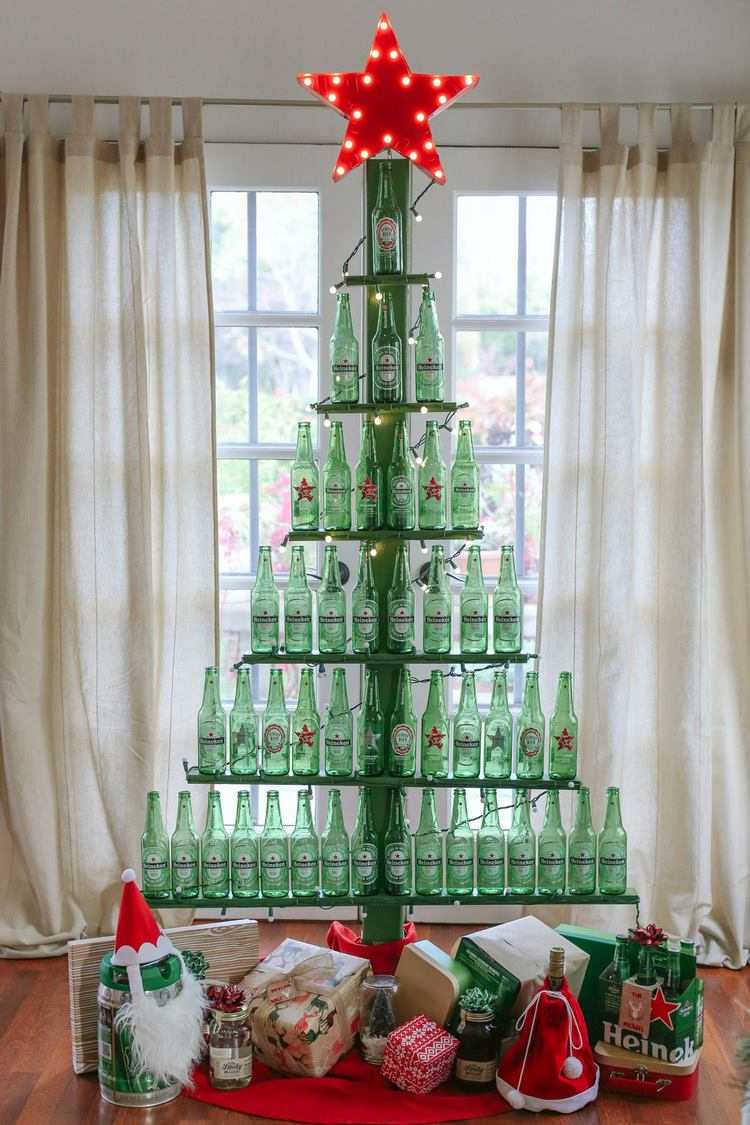 Christmas tree from wooden shelves and beer bottles