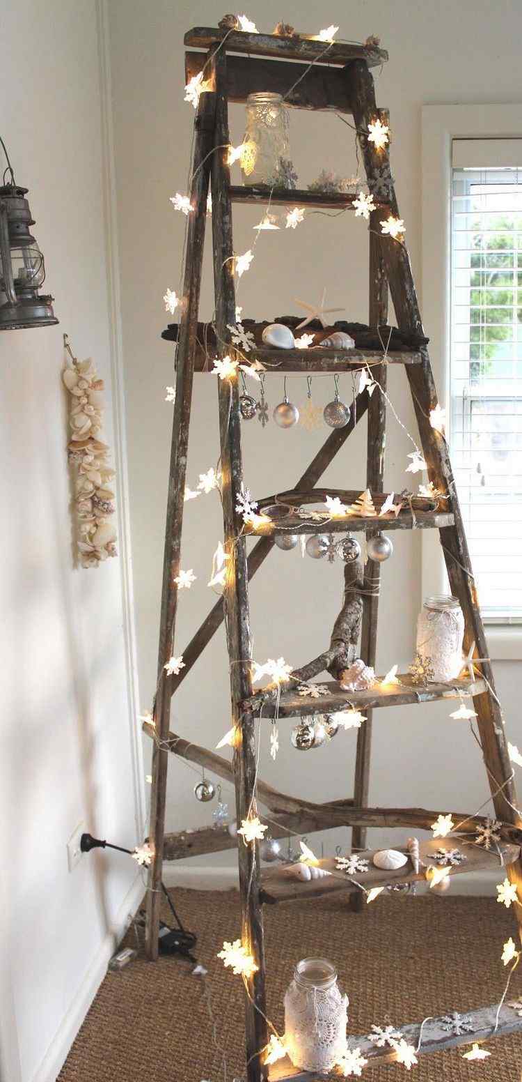 wooden ladder decorated with Christmas lights