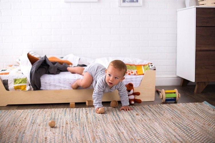 Montessori floor bed and area rug toddler baby room ideas