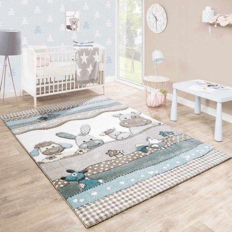 baby room design in neutral colors with soft area rug