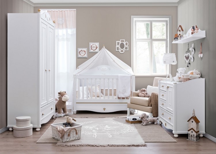lovely baby room design with beige walls and white furniture