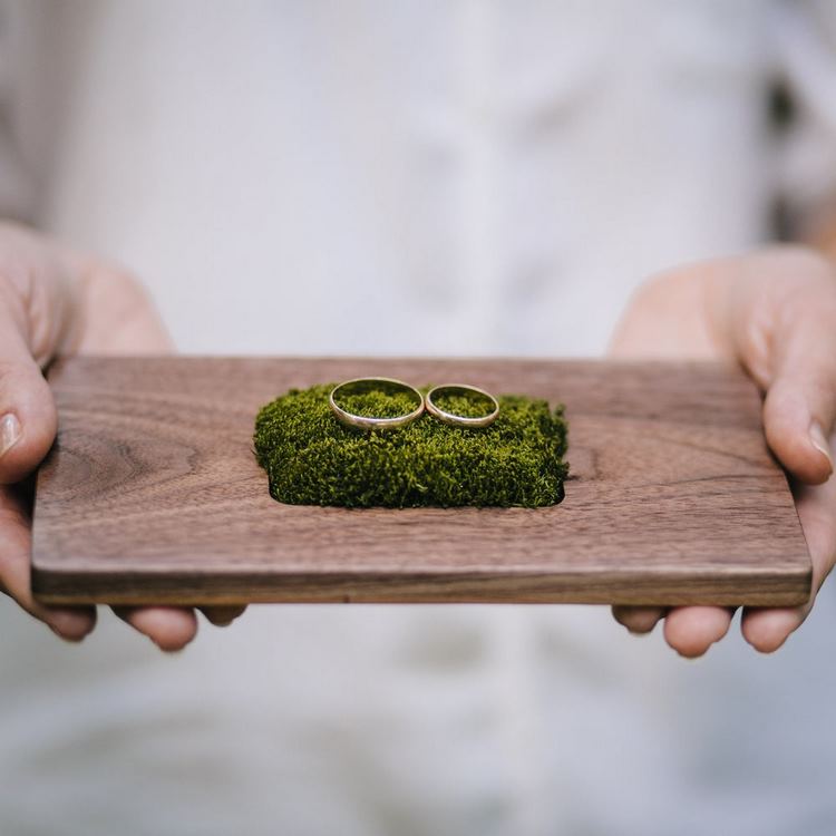 wooden wedding ring holder with moss
