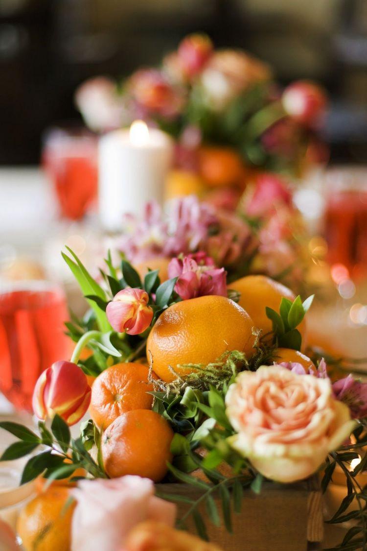 DIY table centerpiece with flowers and fruits festive decorations