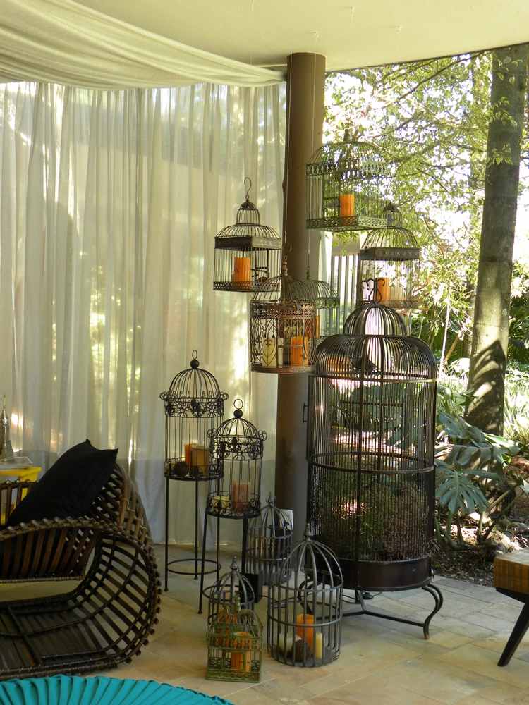 awesome patio decor with different size bird cages