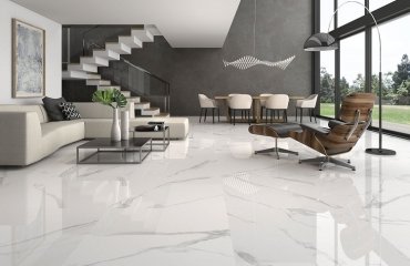 contemporary-open-plan-living-space-with-marble-tile-floor-and-gray-accent-wall