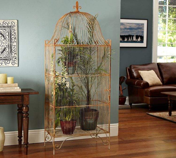 living room decor large birdcage as plant stand
