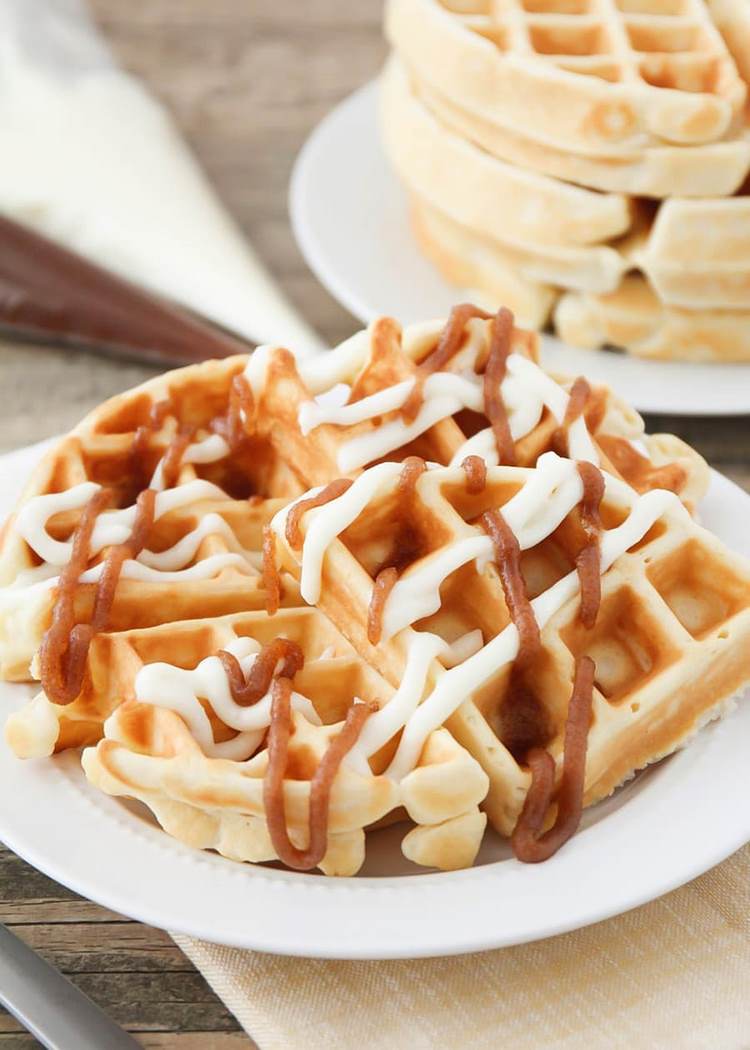 cinnamon roll waffles with cream cheese topping