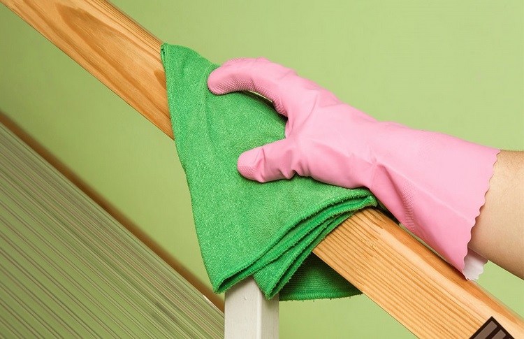cleaning and disinfecting staircase railing 