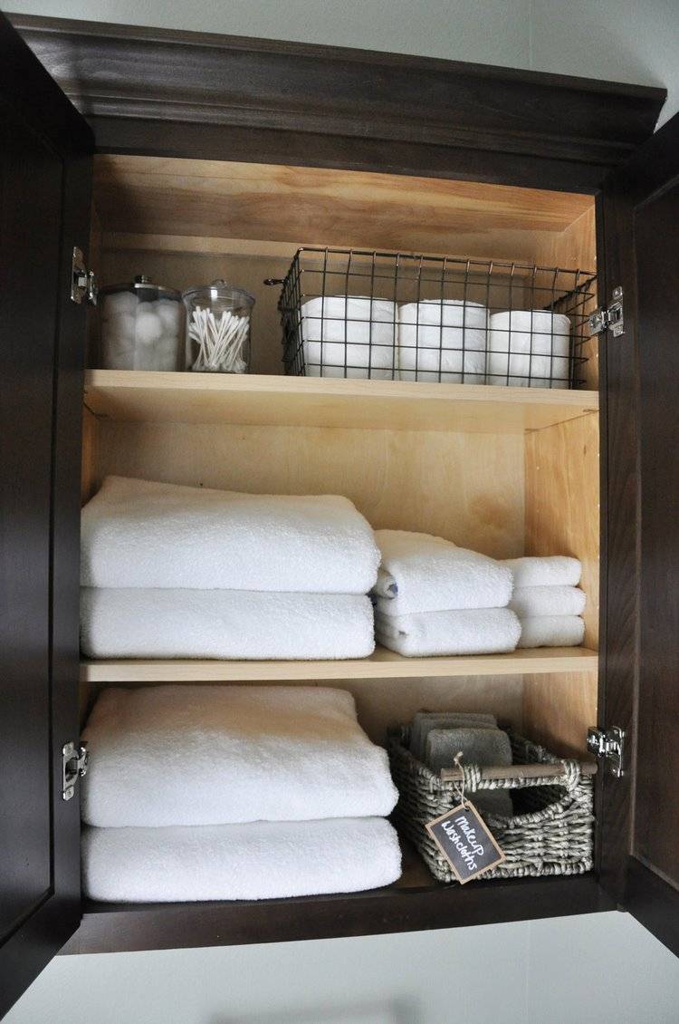 compact storage furniture for guest bathroom