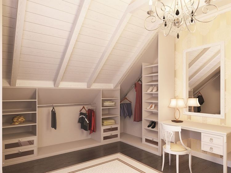 elegant walk in closet with white furniture and dressing table