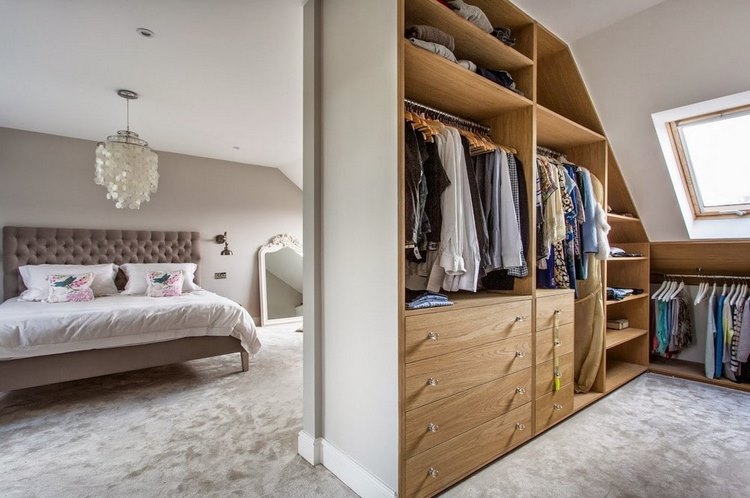 modern attic bedroom design with walk in closet