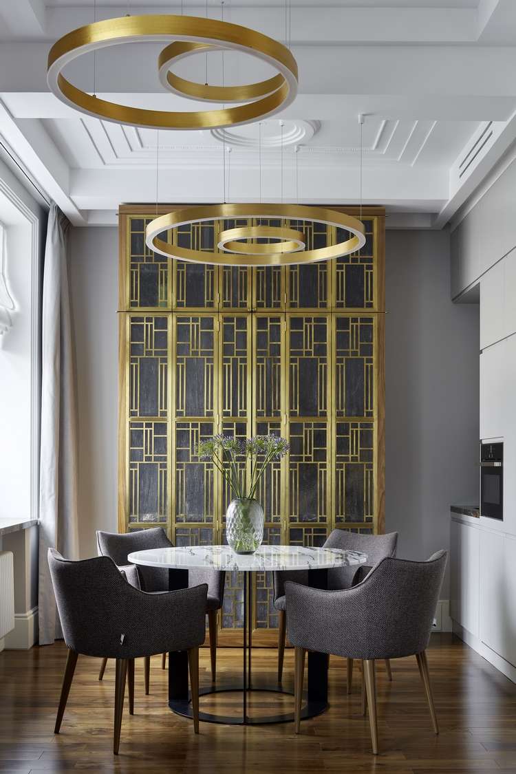 dining room design gray accent wall with gold geometric decoration