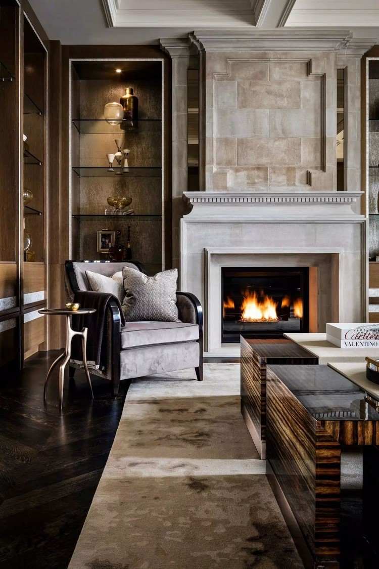 living room design built in shelves fireplace and dark flooring