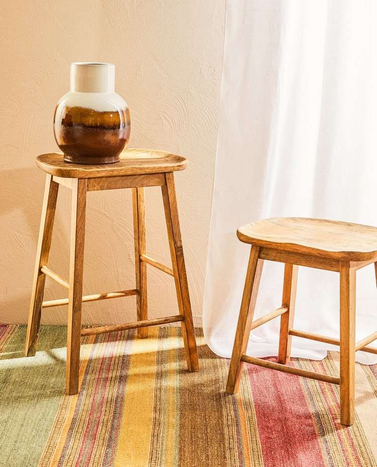 rustic stools and ceramic flower pot