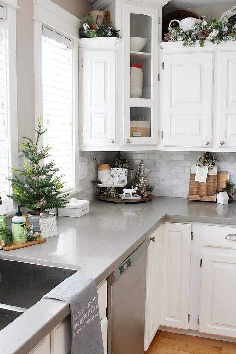 smart ways to use the space above kitchen cabinets