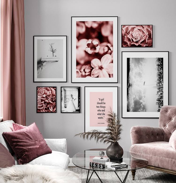 elegant living room design in pink and grey with posters on accent wall