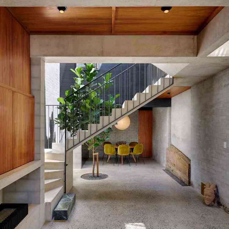 modern concrete staircase and floor and contemporary wooden walls