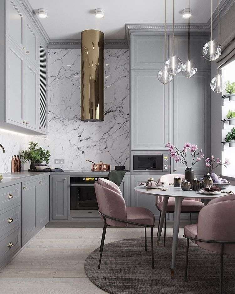 elegant kitchen with grey cabinets and pink accents