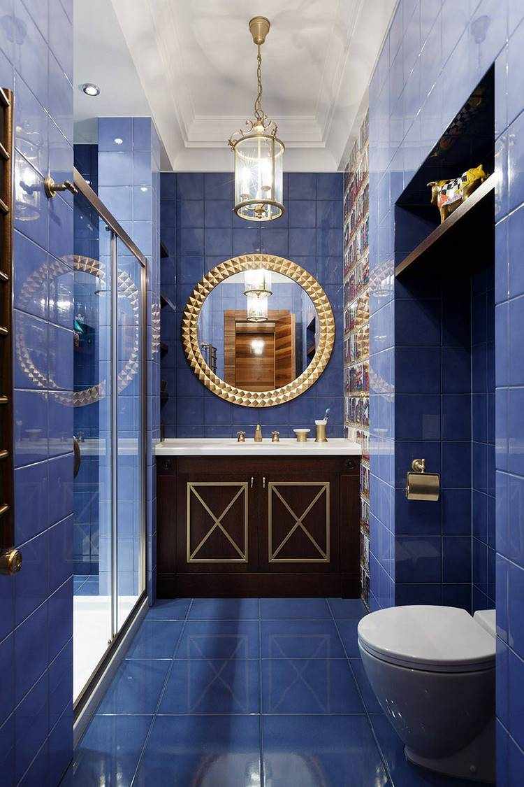 bathroom design in blue and gold
