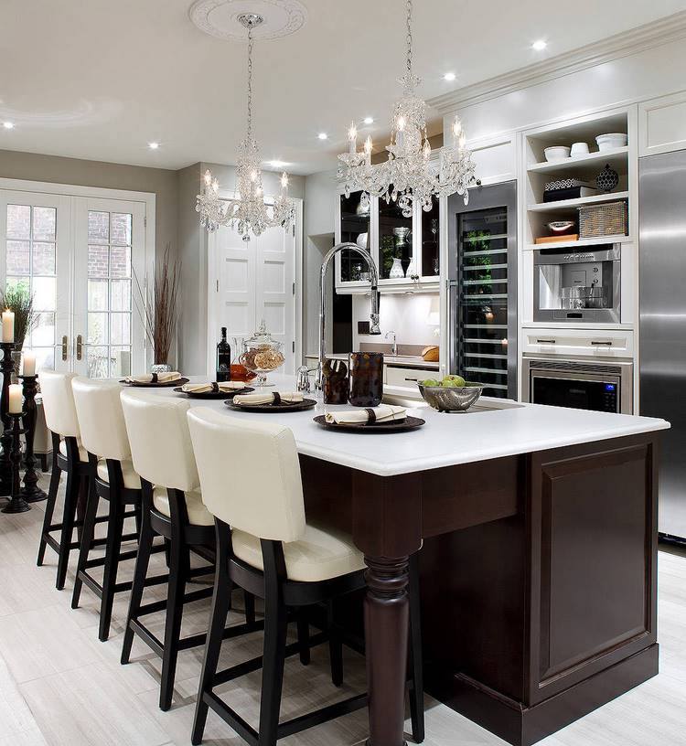 modern kitchen with crystal chandeliers and recessed lighting