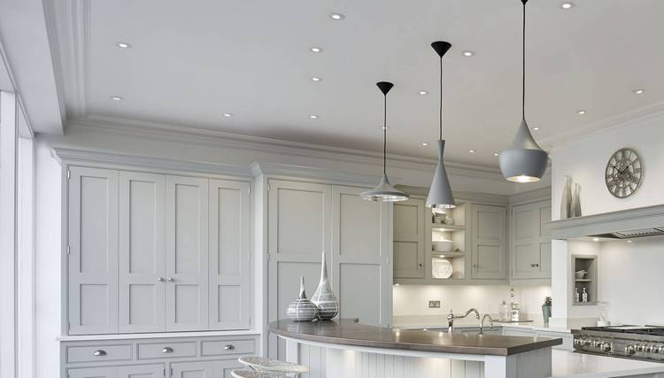 pendants and recessed lighting above kitchen island