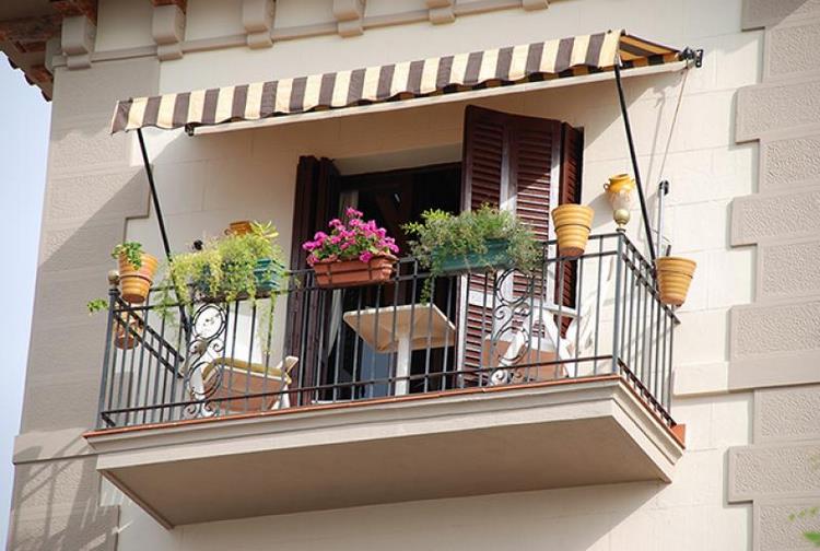 small balcony with awning