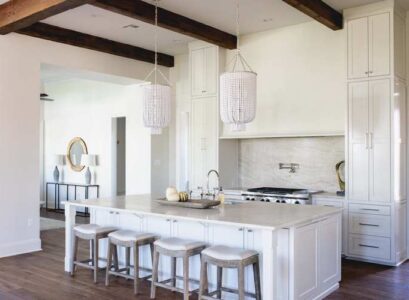 white-kitchen-with-two-chandeliers-above-kitchen-island