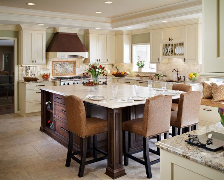 kitchen island with dining area and upholstered chairs