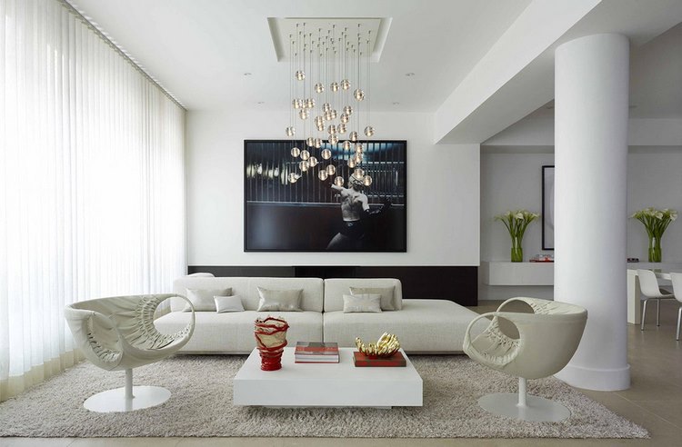 living room with cascading chandelier