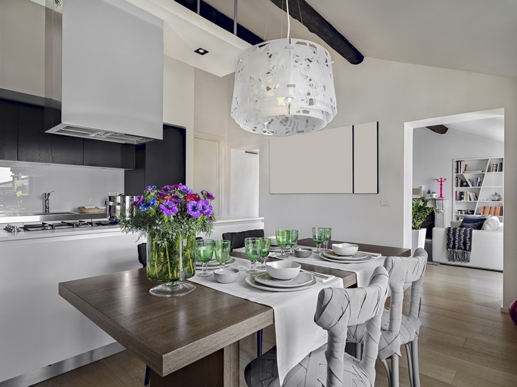 modern kitchen chandelier above dining table