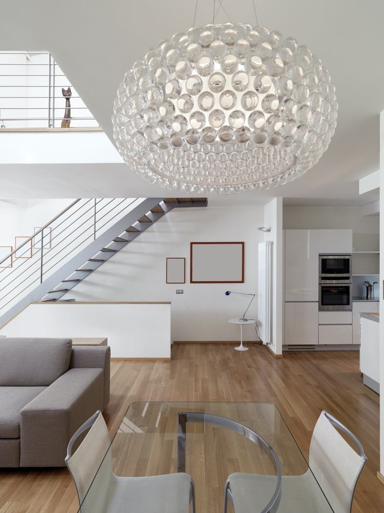 modern living room with oversized chandelier