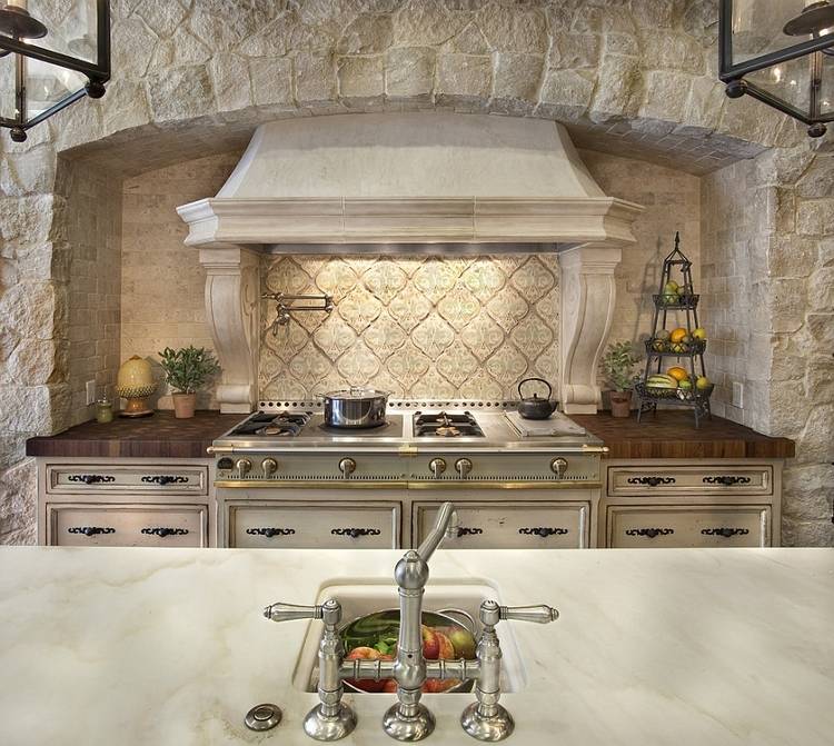 decorative accents range hood and arch curve in kitchen design