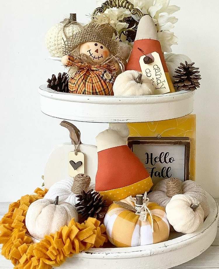 tiered plate with fall decorations scarecrow mini pumpkins