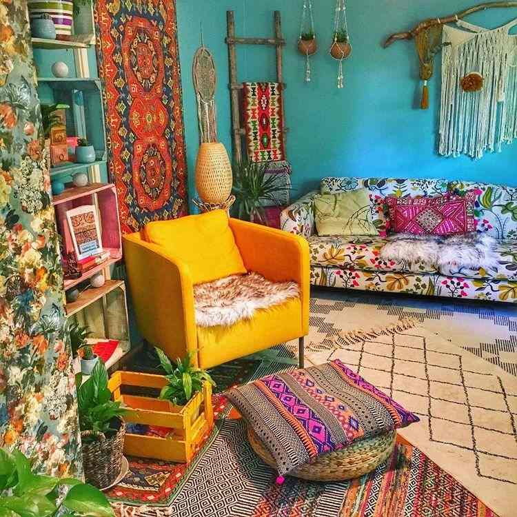 bright colors in boho living room armchair and floor cushions