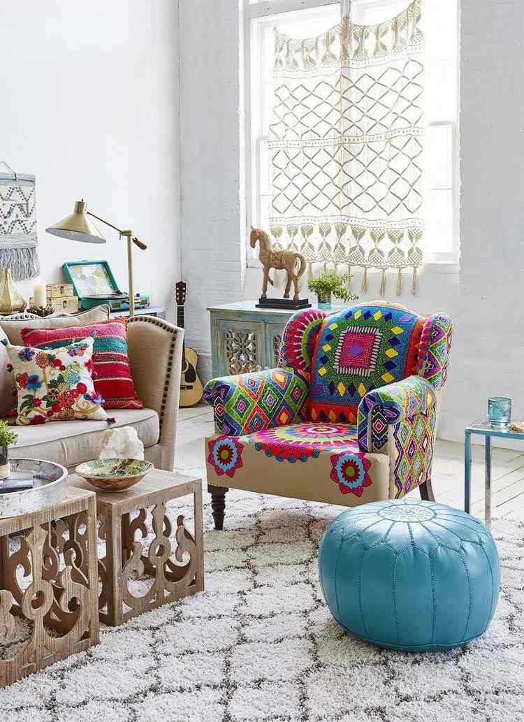 boho chic living room with leather ottoman armchair coffee tables
