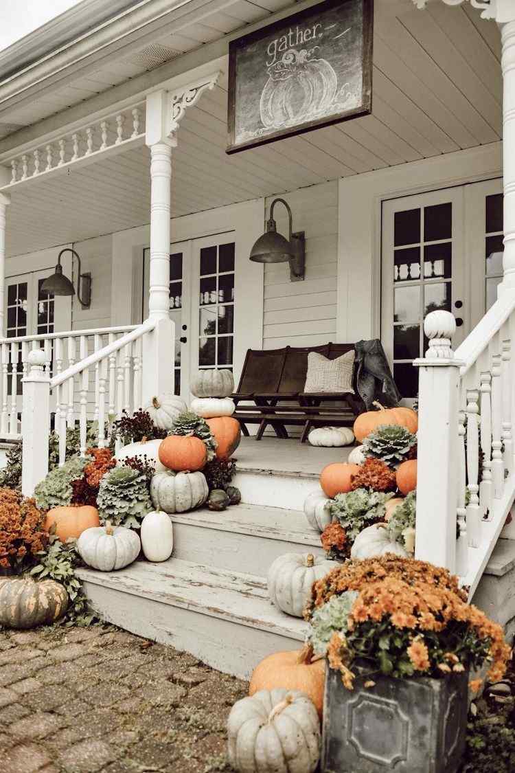 front porch fall decor ideas with flowers and pumpkins
