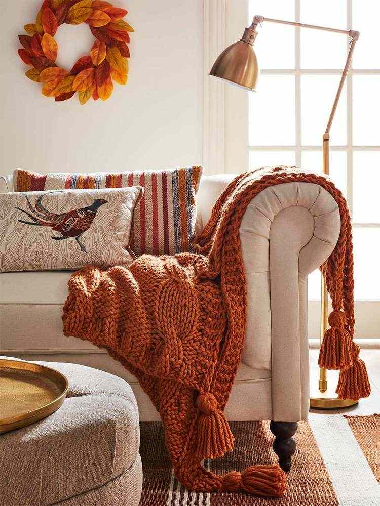 living room fall decor knitted blanket pillows wall wreath