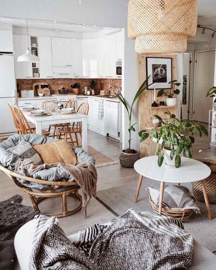 open plan living space decorated in boho style