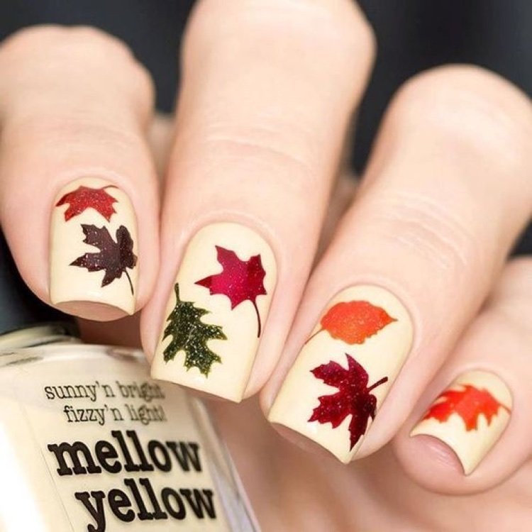 elegant french manicure fall leaves nail art on pastel base