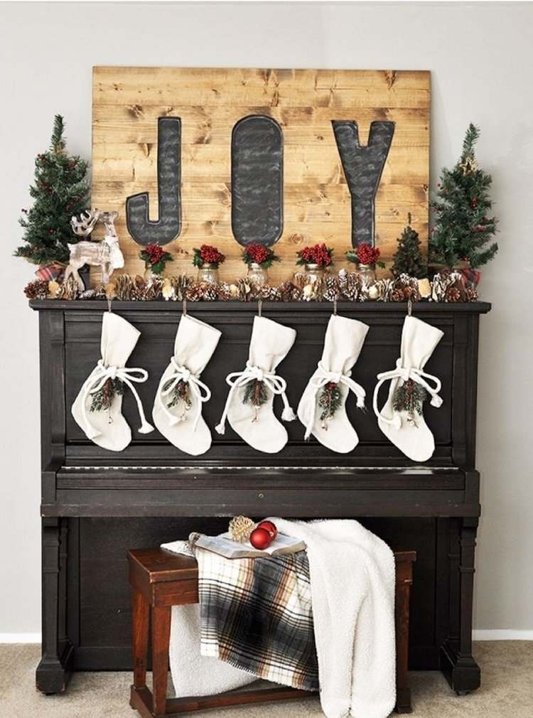 Christmas decor ideas hang stockings on the piano