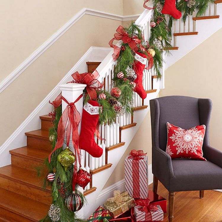 Christmas decoration ideas staircase garland evergreens and stockings